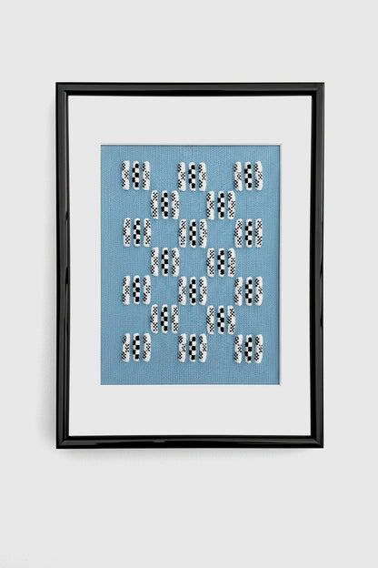 Framed artwork with text on a blue background